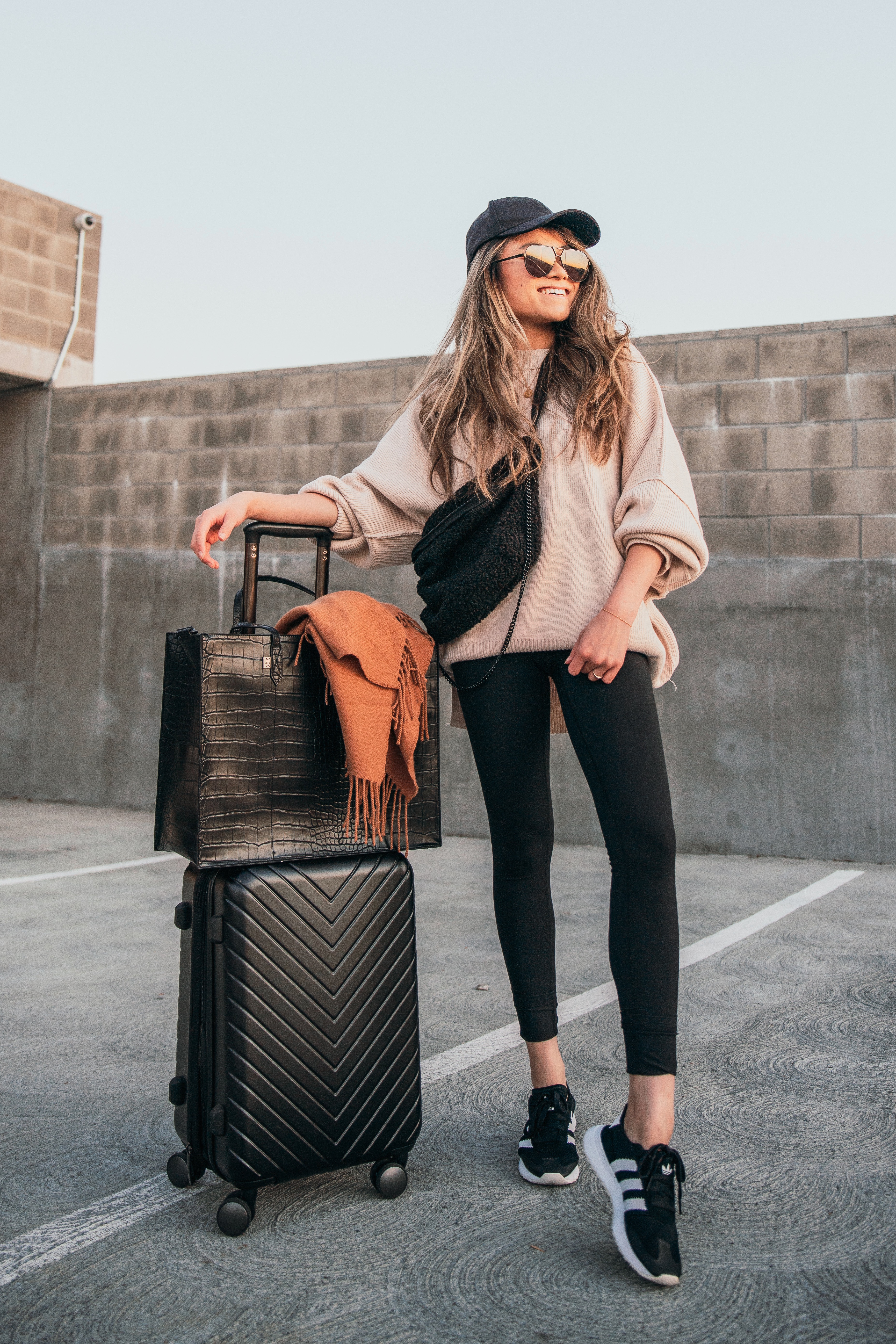 The Best Faux Leather Pieces In My Wardrobe - Under $150  Airport outfit,  Winter travel outfit, Louis vuitton luggage